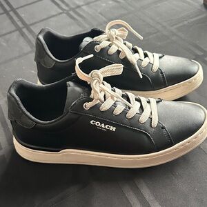 Coach women’s Black and White Sneakers